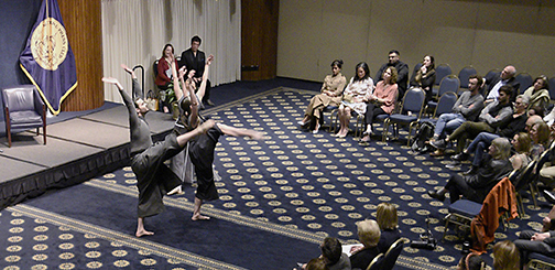 Members of Burgess’ dance troupe perform during the Feb. 23 event.