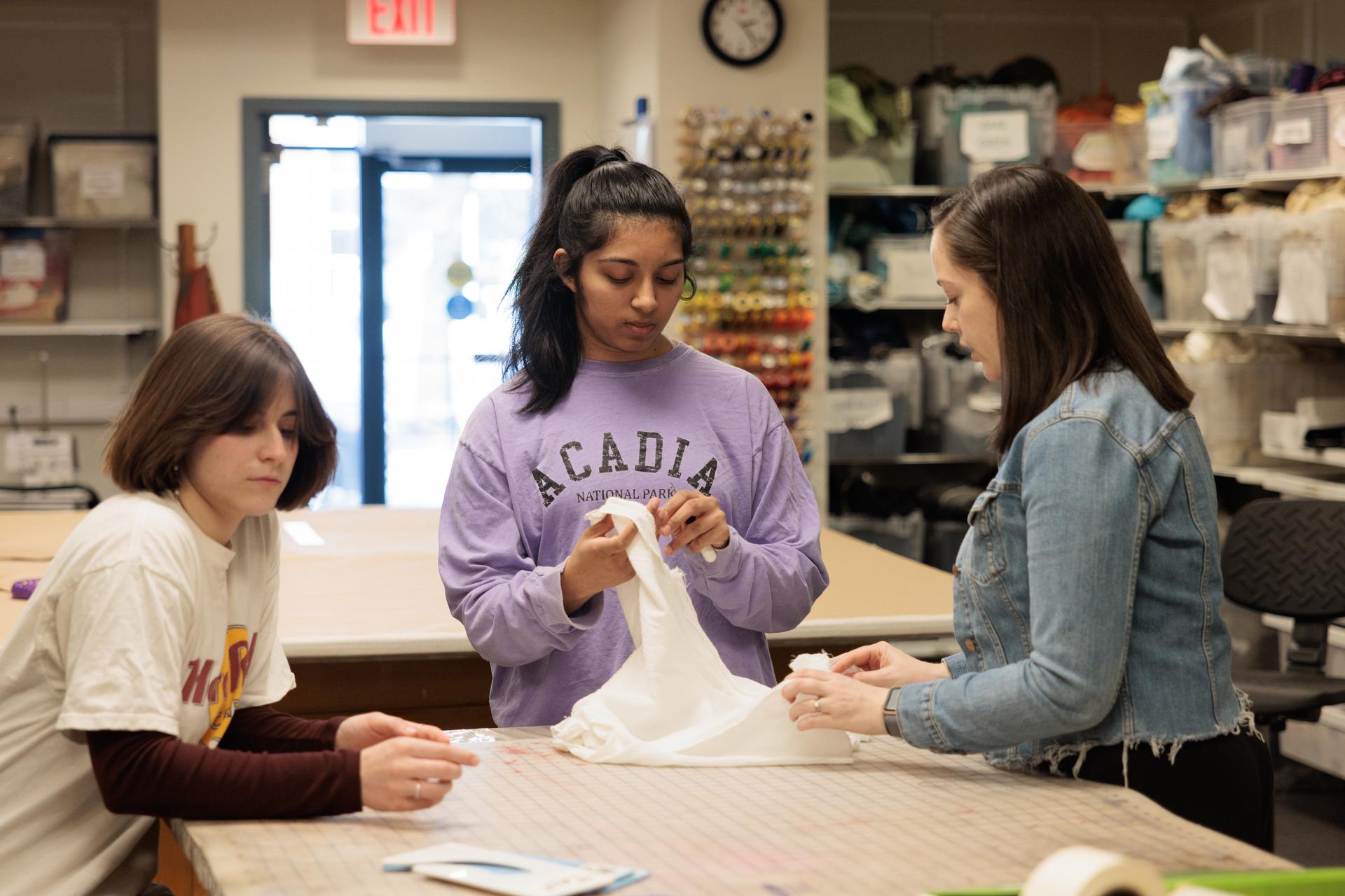 Students work in the costume shop in Samson Hall (photographed by William Atkins).