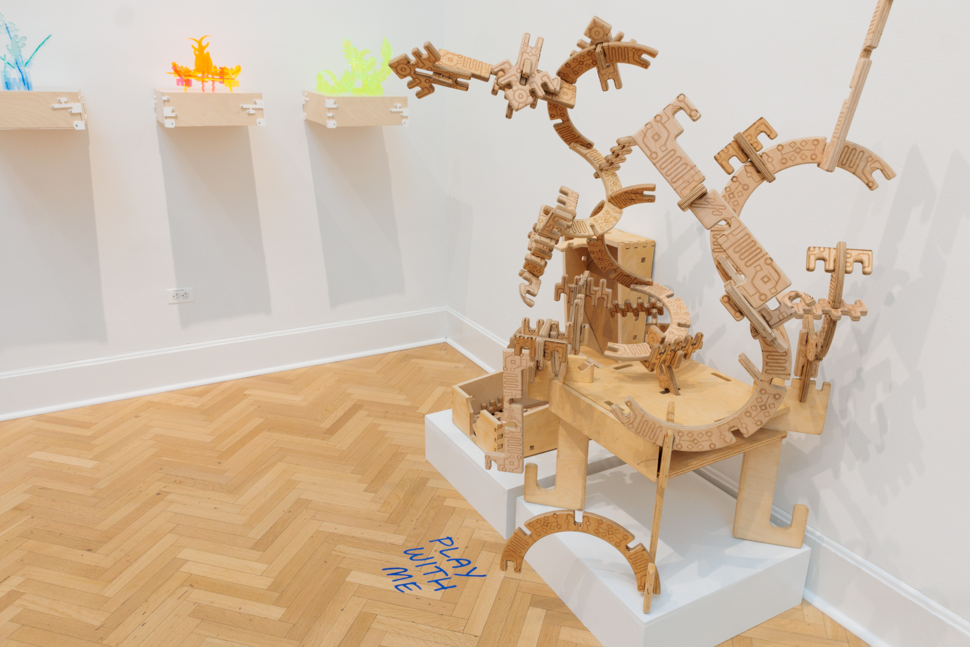 Sculptural works by Isaiah Aladejobi include one inviting guests to join in the fun. (William Atkins/GW Today)
