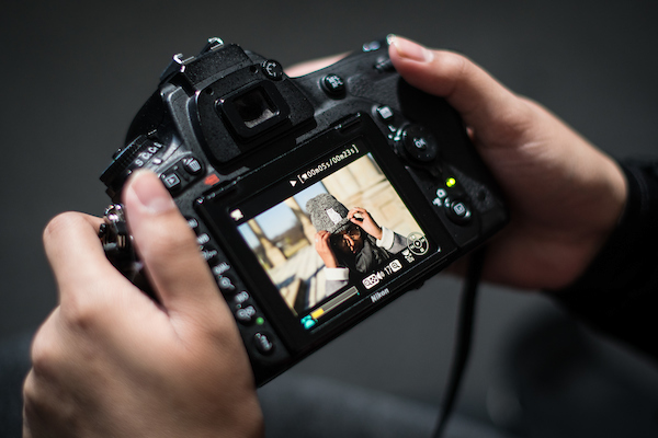 New Media Photojournalism Student Sana Ullah working on her thesis, "Places You'll Pray.” (2017)