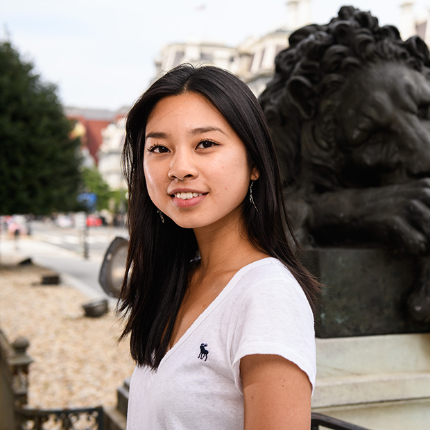 Two students sitting on the stairs