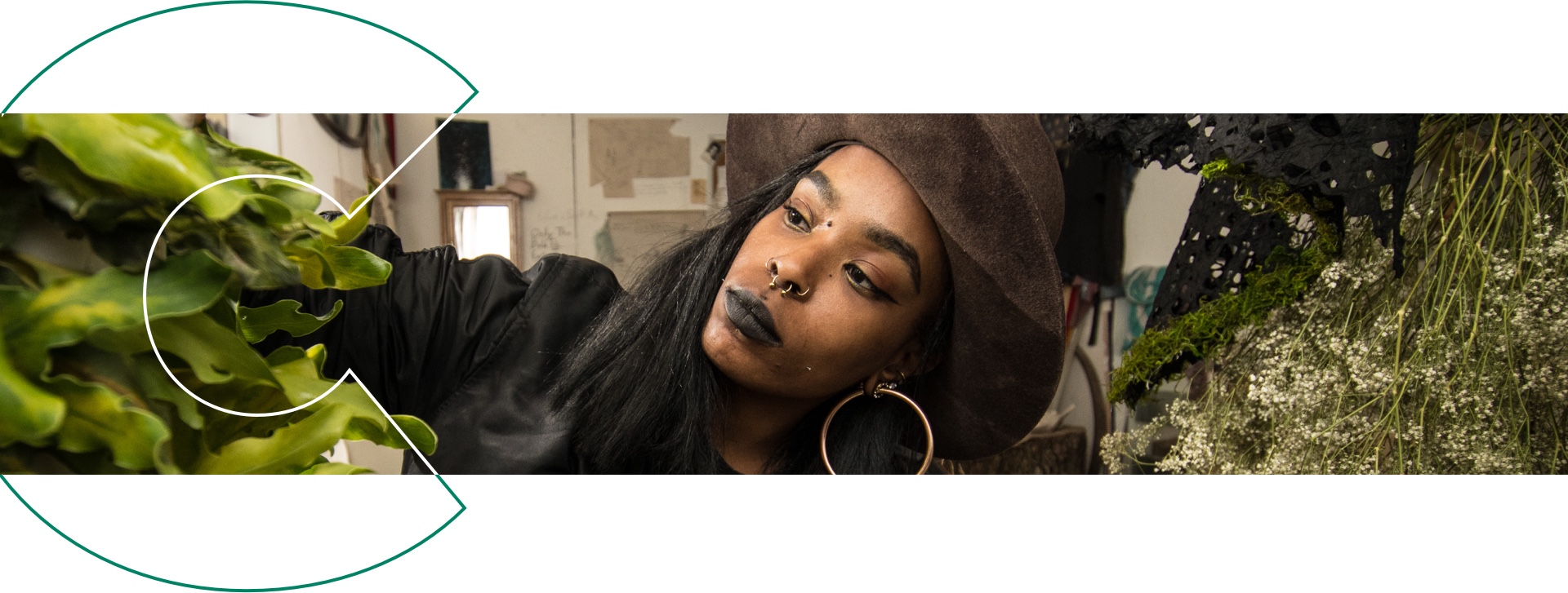 Student working on green exhibit