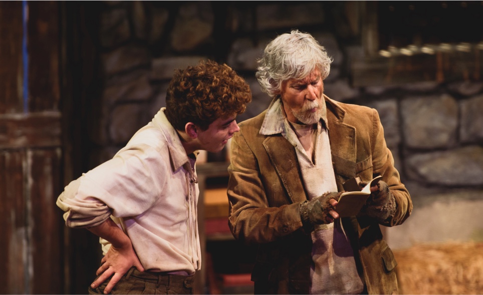 Two men on stage during a performance