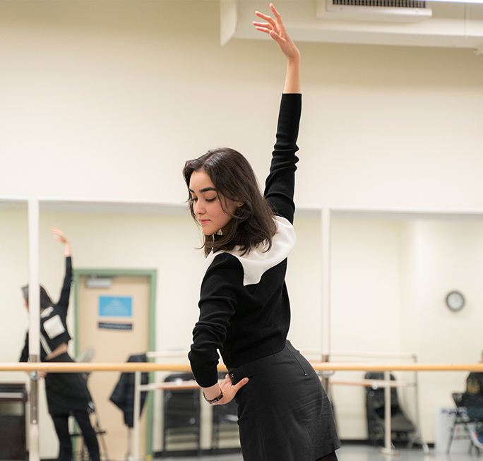female student practicing performance