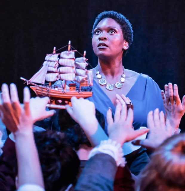 woman performing on stage