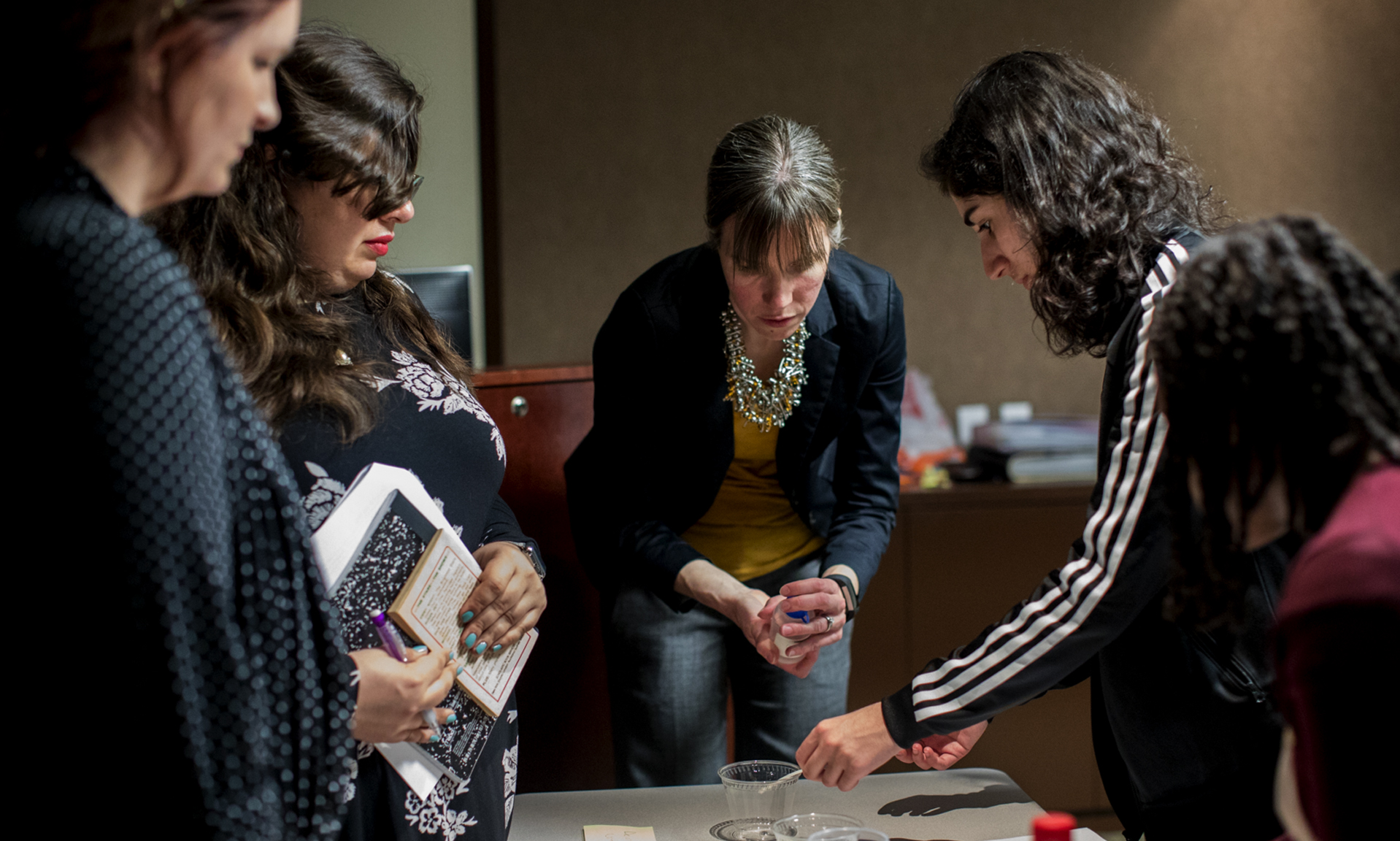 People work on an art project