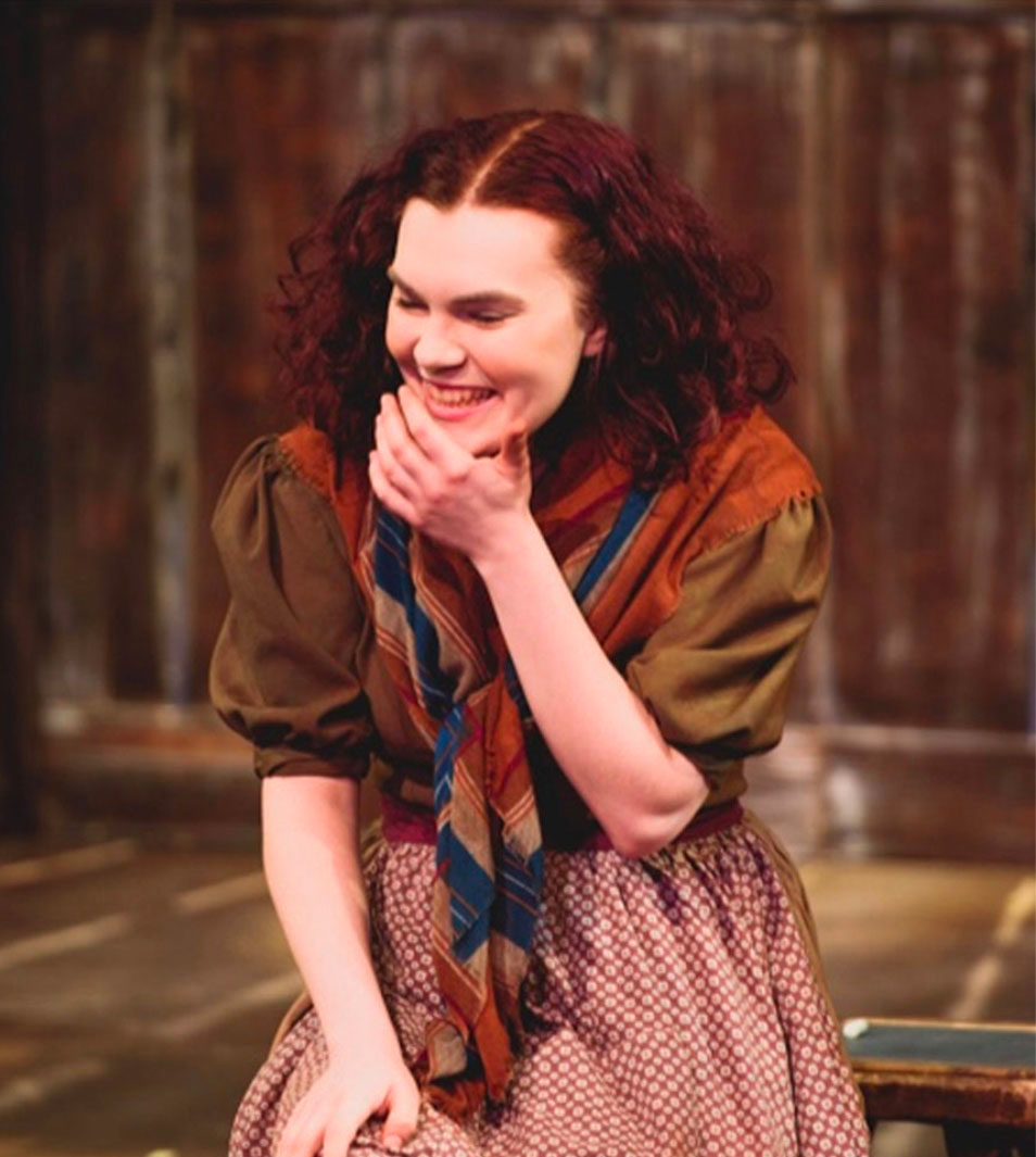 Student performing on stage