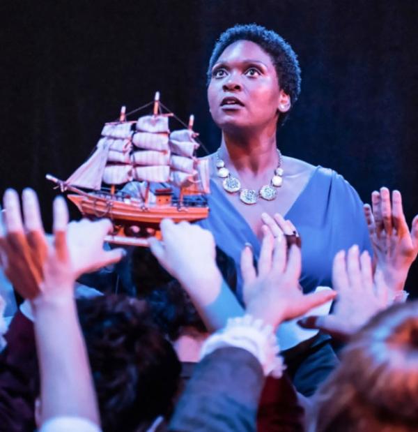 woman performing on stage