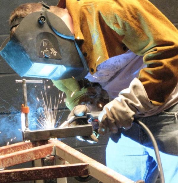 Student working on metal project