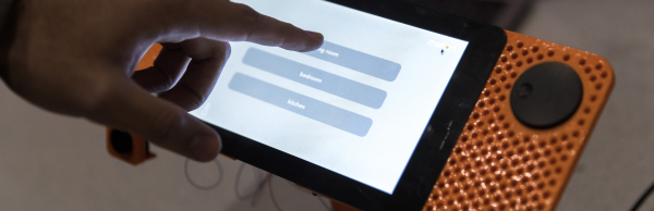 A close up of a finger on a touchscreen