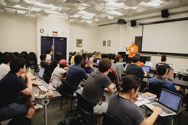 A professor lectures to students