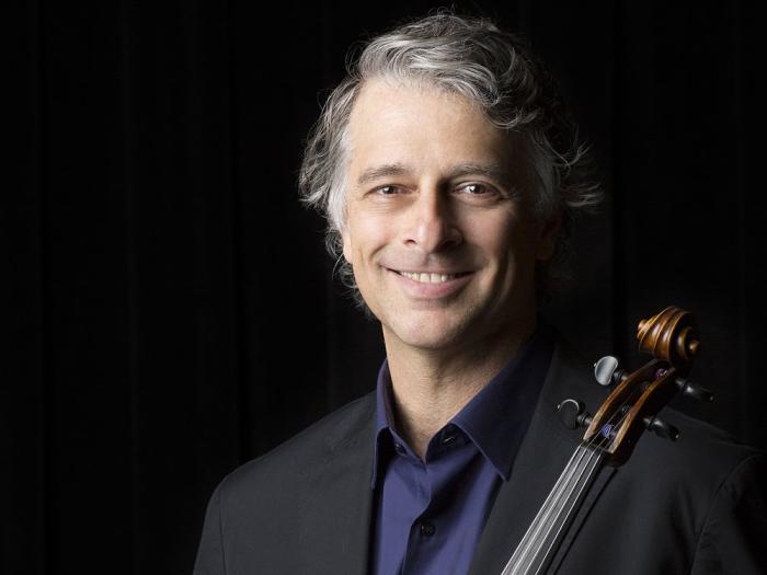 Uri Wassertzug poses with violin