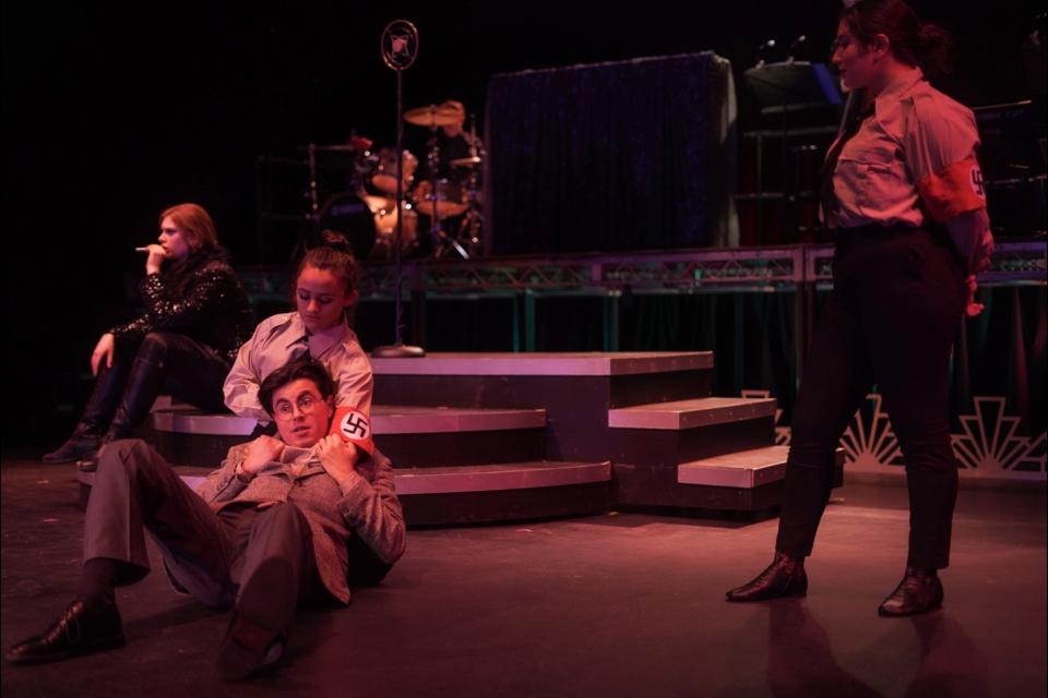 Actors performing in Cabaret