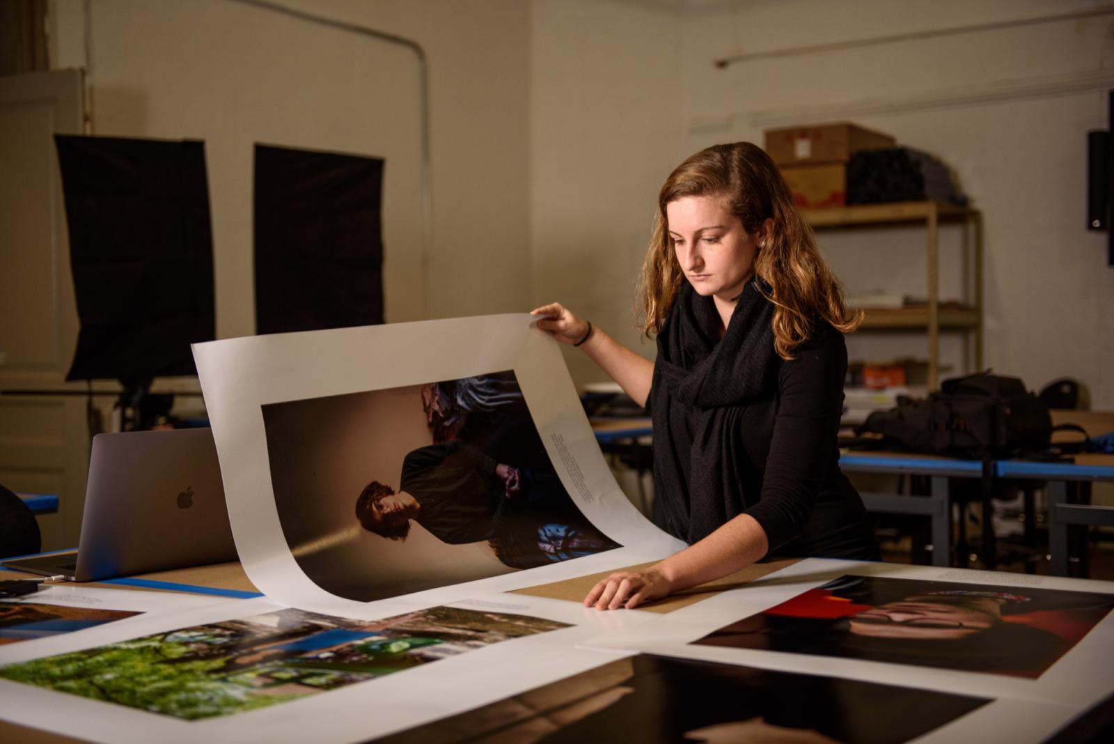 Margaret sorts her photographs