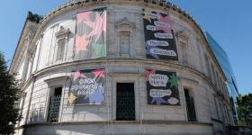 Promotional materials for this year's NEXT Festival, including the banners adorning the Flagg Building, were designed by students. (William Atkins/GW Today)