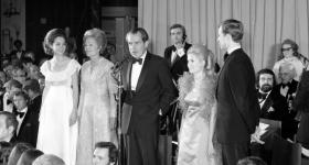 Newly inaugurated President Richard M. Nixon at what is now the National Museum of American History, with Patricia Nixon, Julie Nixon Eisenhower, Tricia Nixon Cox and Edward F. Cox on Jan. 20, 1973. (Richard Hofmeister/Smithsonian Institution Archives)